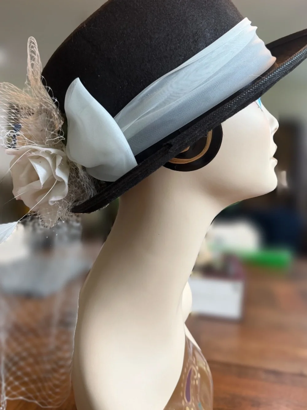 Black Felt Top Hat With White Toole Band, Silk Flowers, Feathers and Netting